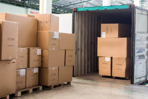 Cartons staged before container loading