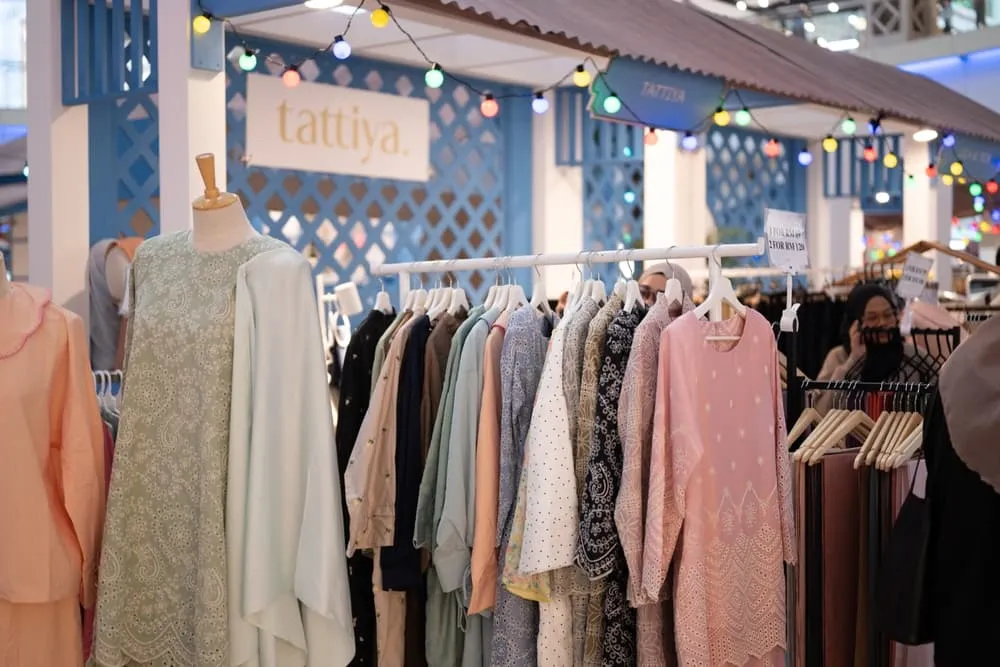 Racks of modest dresses and hijabs in a boutique
